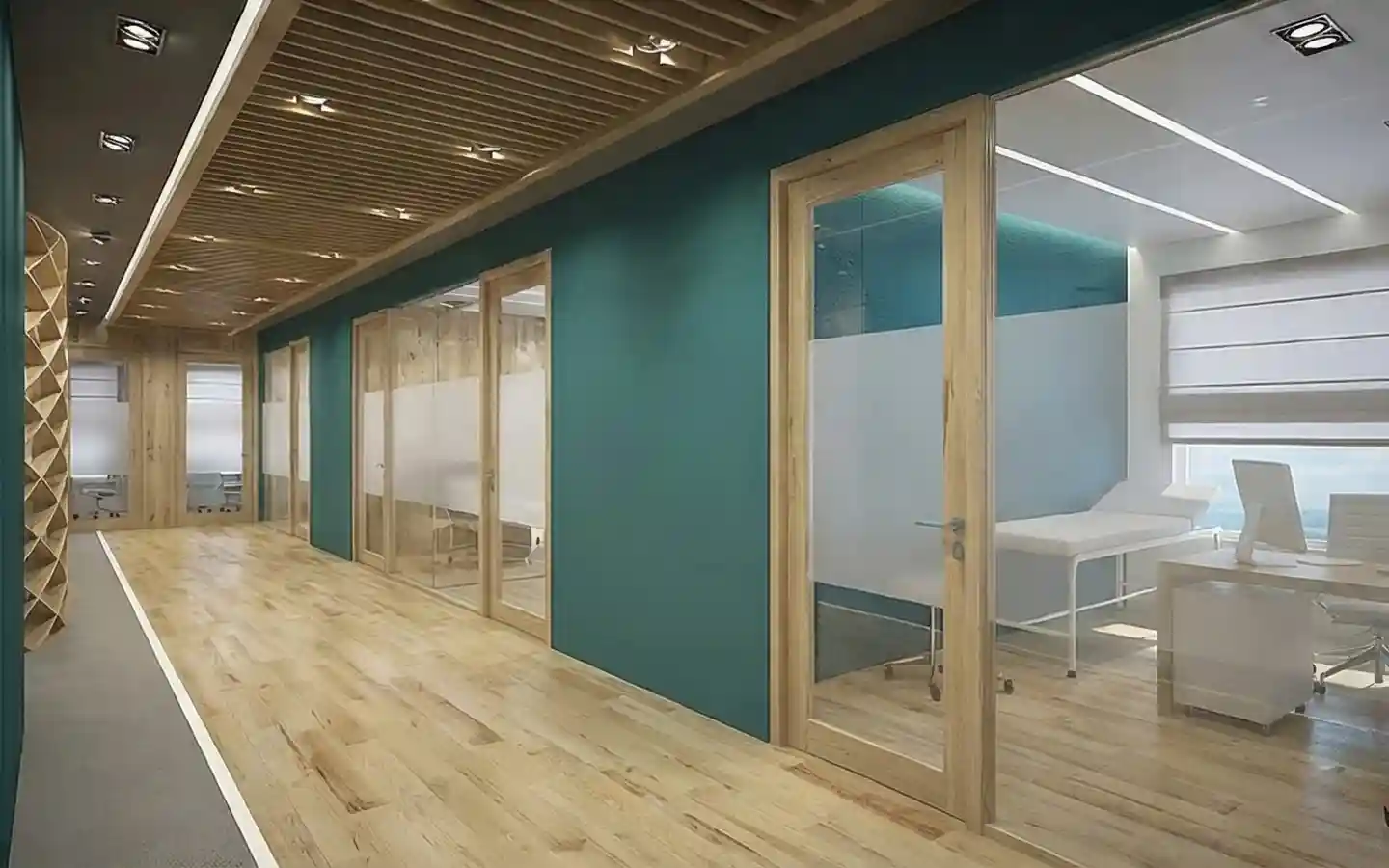 Modern medical clinic hallway featuring teal accent walls, wood slat ceilings, and glass-partitioned consultation cabins with light wood flooring