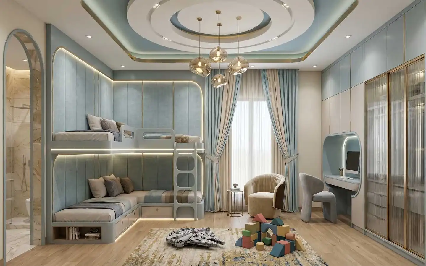 Elegant kids' bedroom with blue upholstered bunk beds, integrated study desk, and modern lighting by interior designers in Delhi NCR