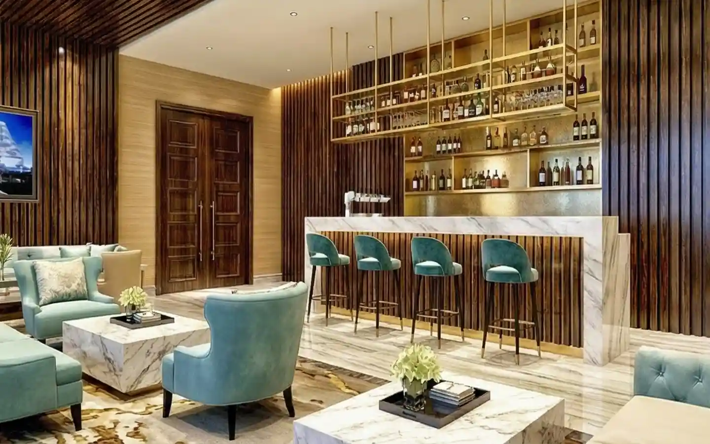 Boutique hotel bar lounge featuring teal velvet wingback chairs, marble coffee tables, and a marble bar with a suspended gold brass bottle rack