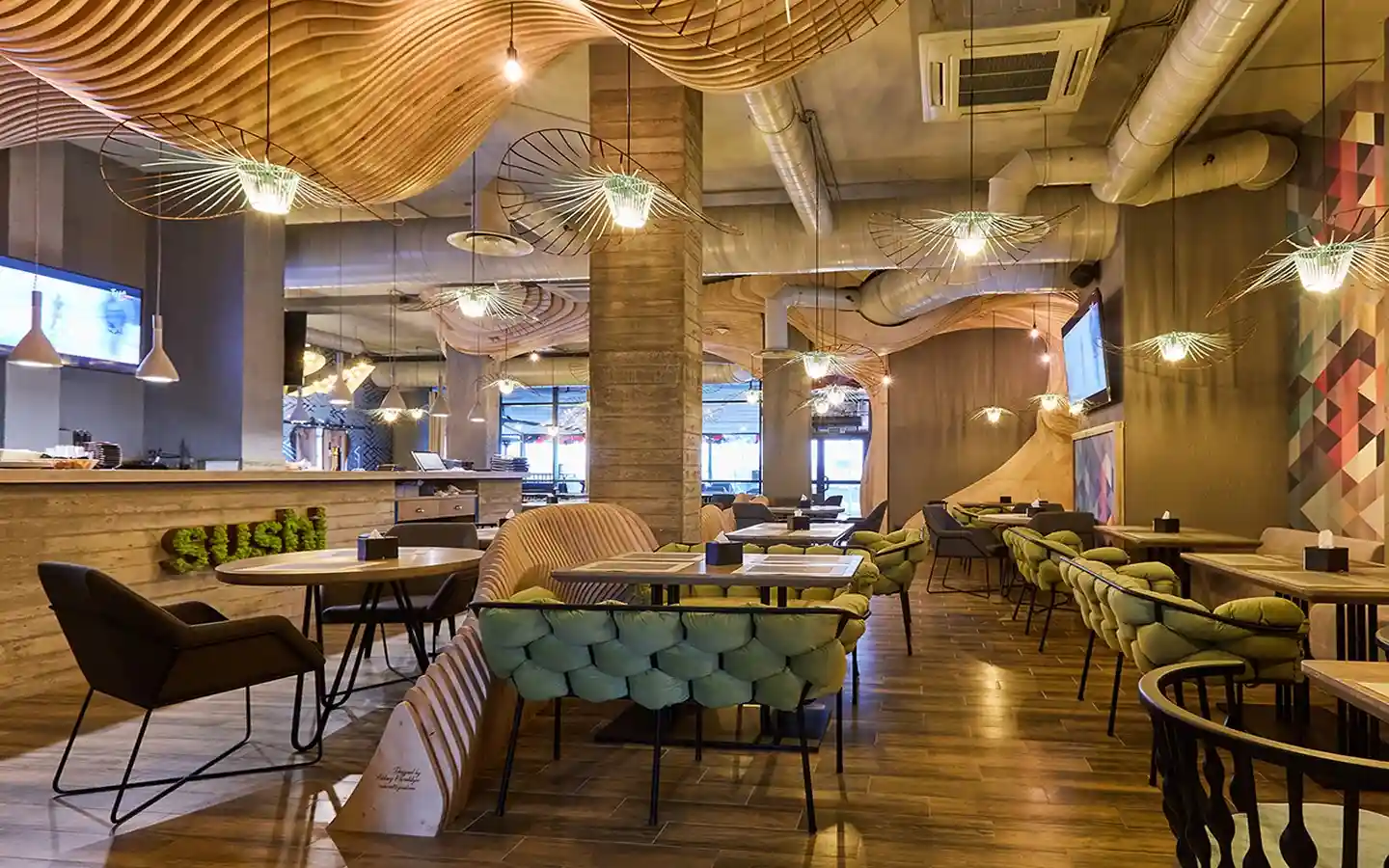 Creative sushi restaurant interior featuring wavy parametric wood ceiling installations, unique woven green seating, and modern pendant lighting