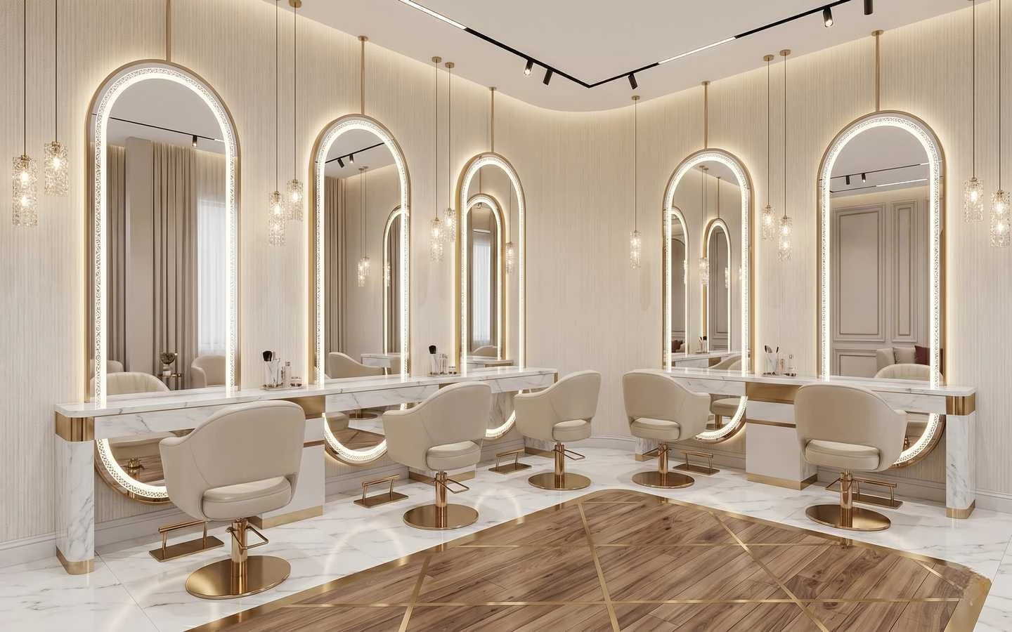 Elegant beauty salon interior featuring white marble counters, arched gold-rimmed backlit mirrors, and cream-colored styling chairs with gold bases