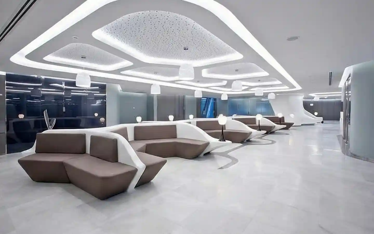 Futuristic multi types professional doctors waiting lounge with organic-shaped modular seating, decorative hexagonal ceiling lights, and minimalist white interior architecture