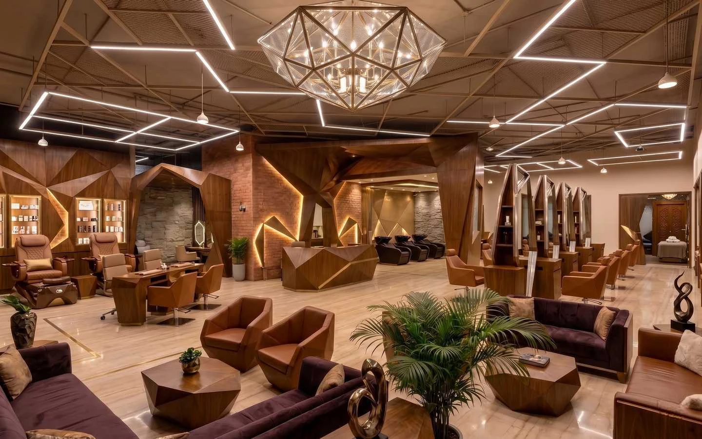 Luxury salon interior featuring geometric wood paneling, diamond-shaped chandelier, purple velvet sofas, and modern hair styling stations
