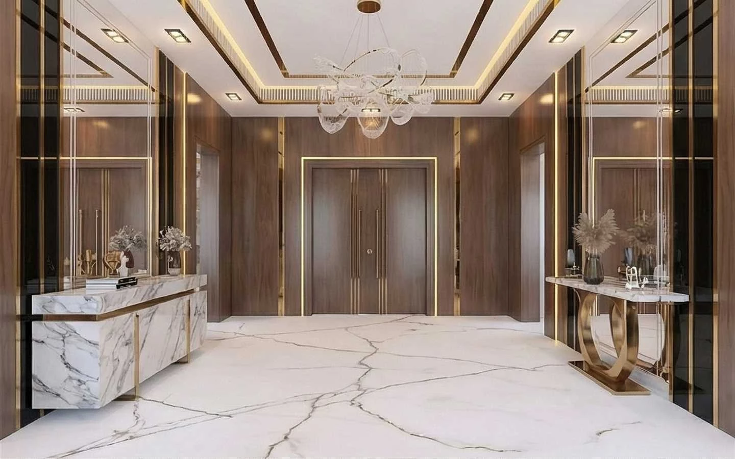Luxury foyer featuring white marble flooring with grey veining, wood-paneled walls with gold trim, a modern glass chandelier, and a marble console table with gold metallic accents