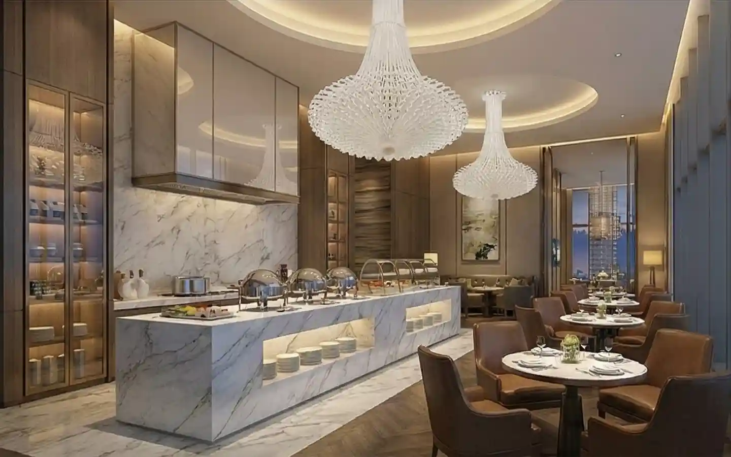 Modern hotel buffet area featuring a white marble island, large crystal chandeliers, and leather seating in a luxury dining hall