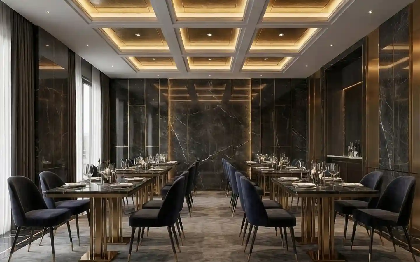 Elegant hotel restaurant featuring black marble wall panels, gold-trimmed tables, velvet chairs, and a modern coffered ceiling with recessed lighting