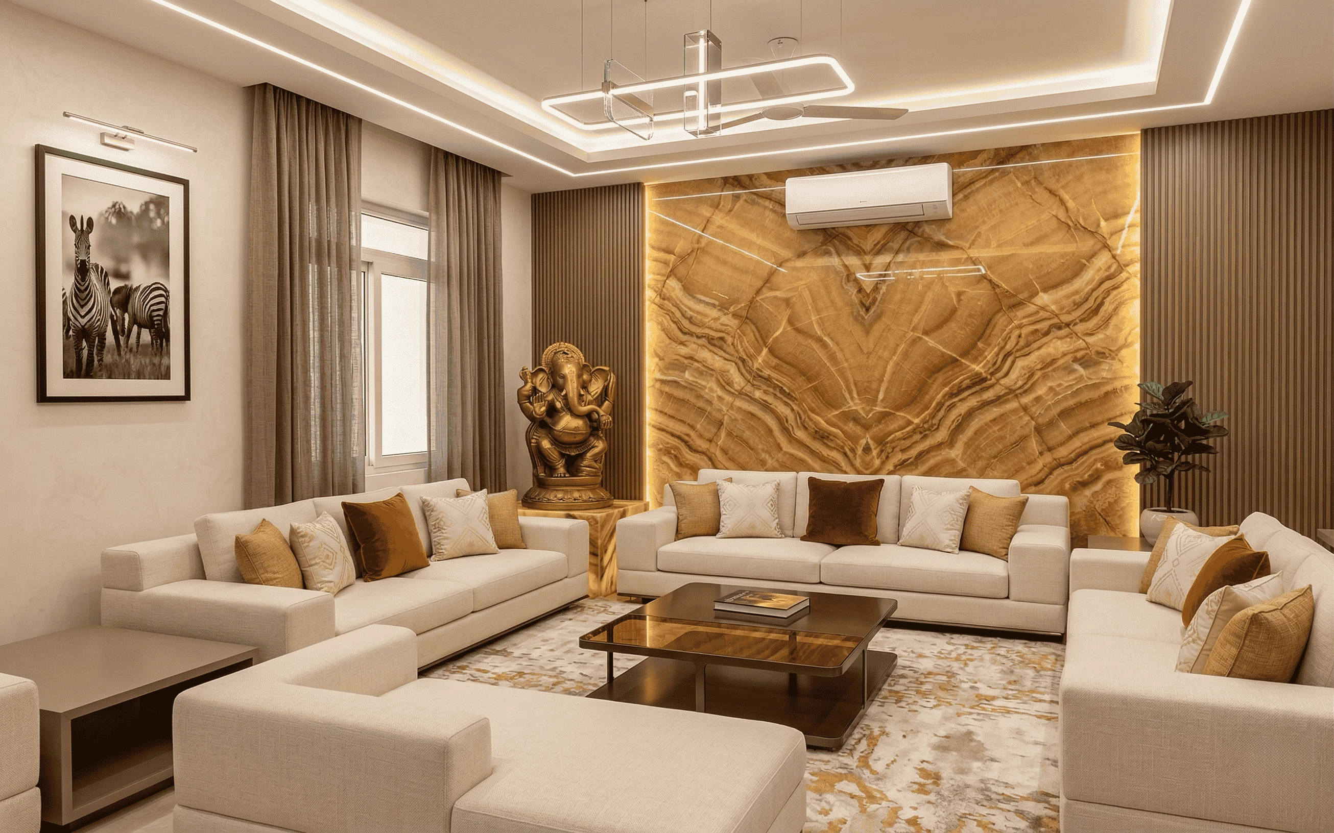 Luxury living room interior design featuring a backlit gold onyx wall panel, cream sectional sofas with mustard pillows, and a large golden Ganesha statue