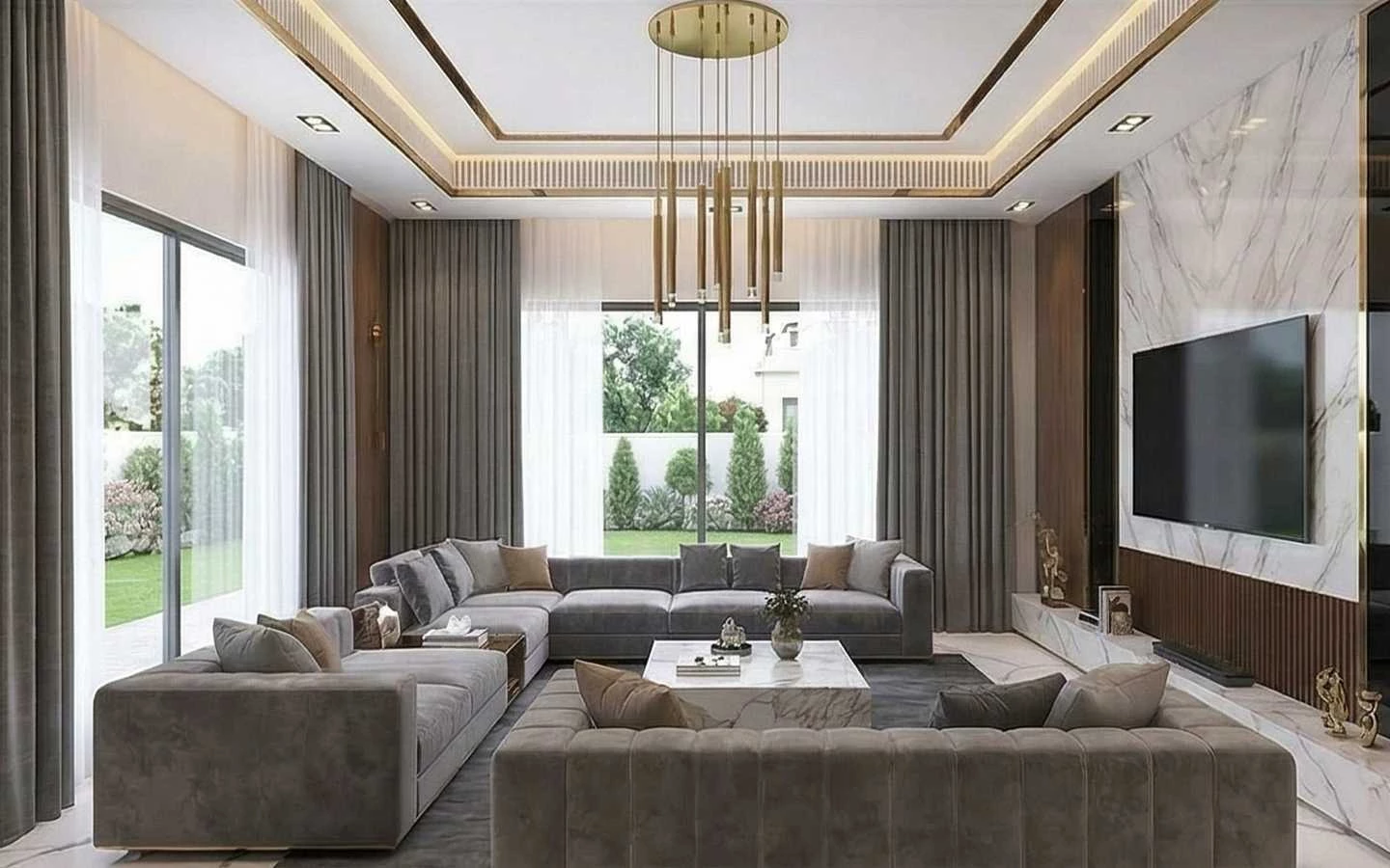 Contemporary luxury living room with a large grey U-shaped sectional sofa, marble TV feature wall, gold tube chandelier, and floor-to-ceiling windows