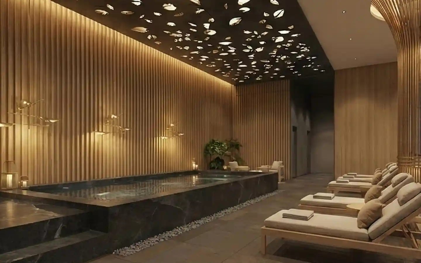 Luxury hotel spa featuring a black marble indoor pool, wooden slat walls, and a decorative cutout ceiling with warm ambient lighting