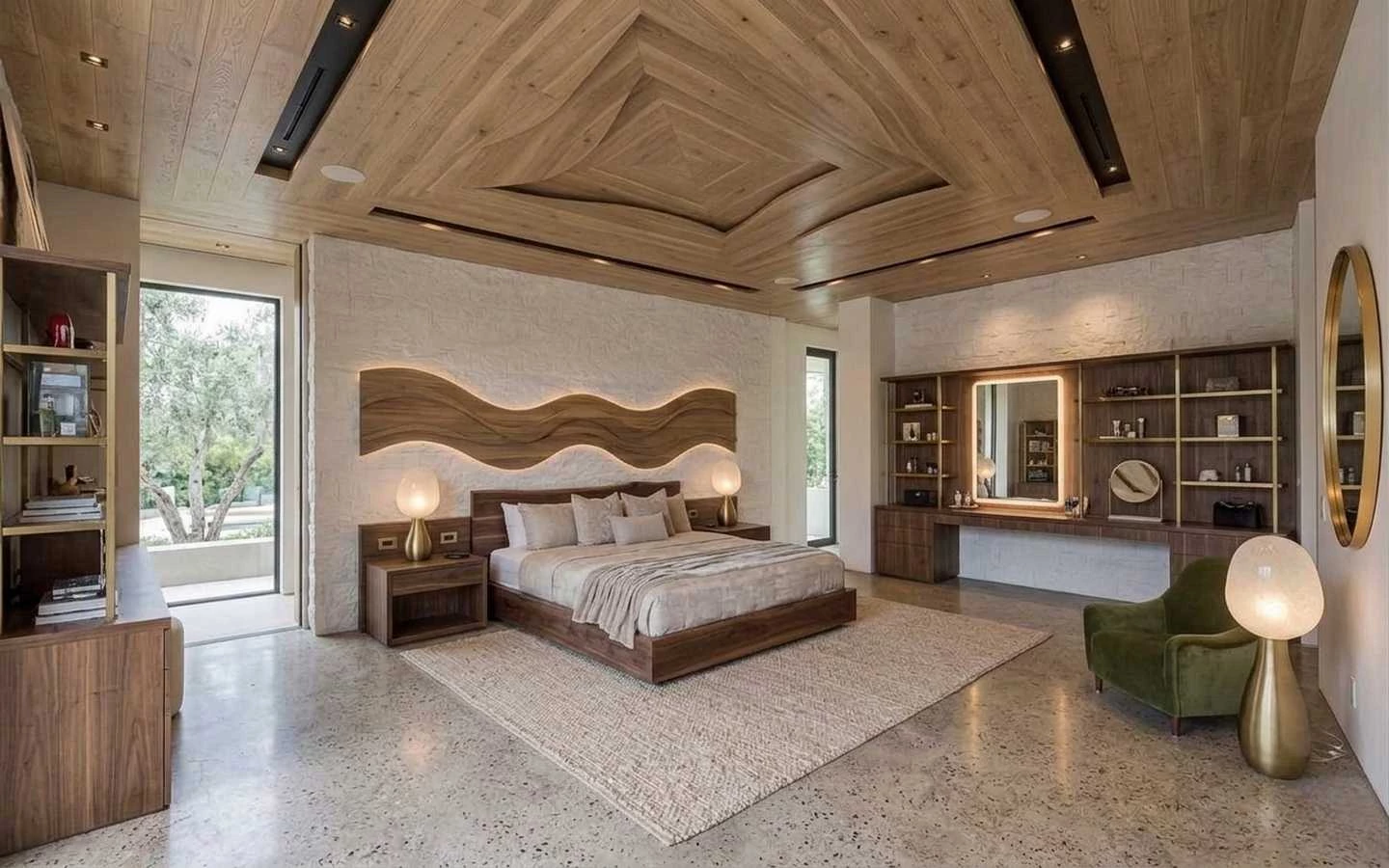 A complete view of a luxury organic farmhouse master bedroom featuring a geometric wood tray ceiling, built-in vanity with LED mirror, and a wavy wood headboard