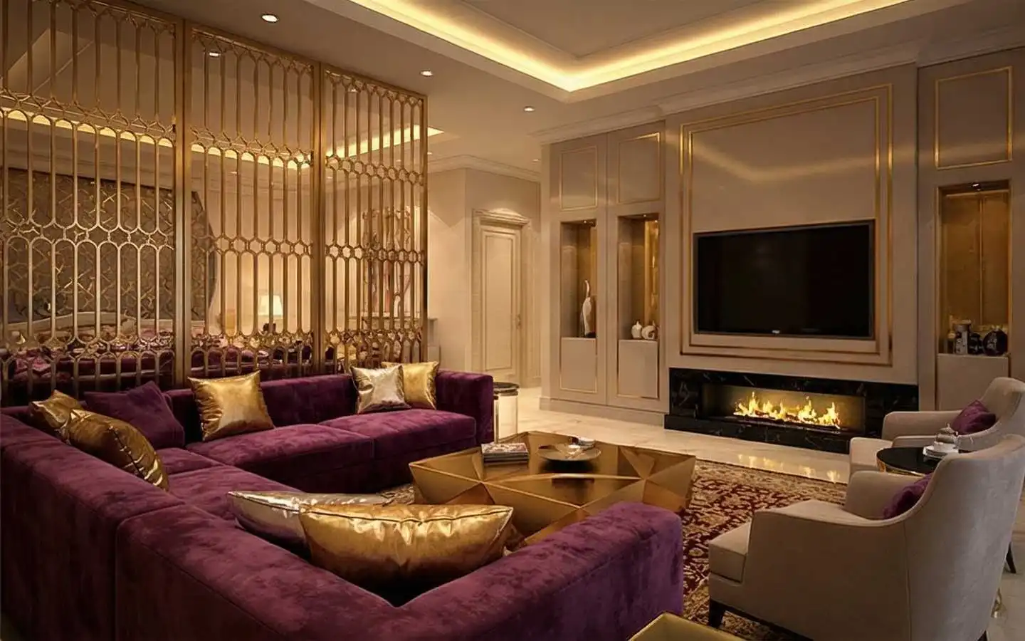 Luxury residential living room featuring a deep purple velvet sectional sofa with gold pillows, a modern gold coffee table, an ornate gold metal room divider, and a linear fireplace below a wall-mounted TV