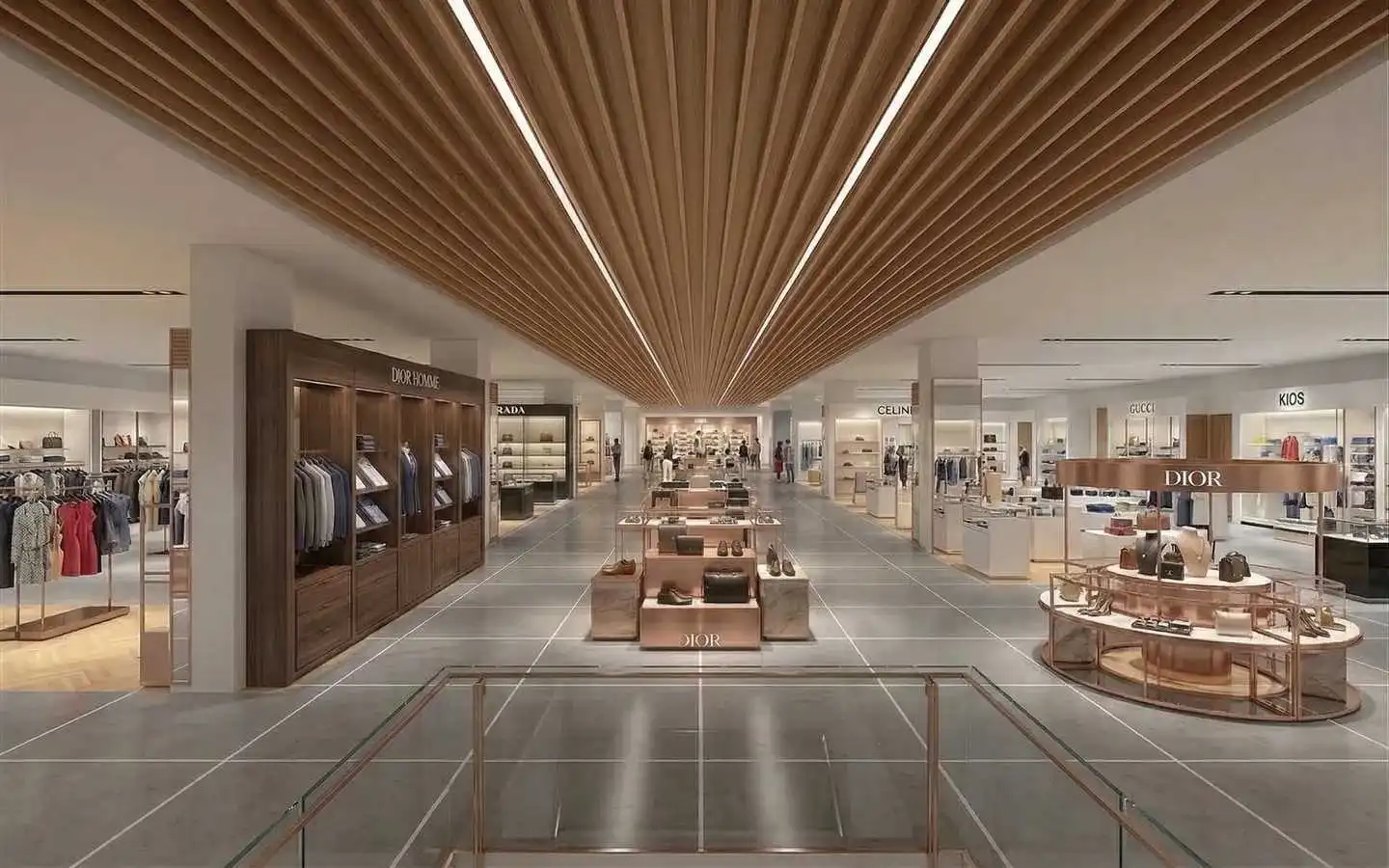 Modern luxury retail showroom interior featuring a linear wooden baffle ceiling, designer clothing displays, and polished grey tile flooring