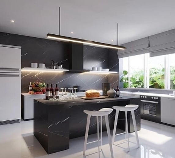 Modern high-contrast kitchen interior design featuring a striking black marble island and matching backsplash, sleek white cabinets, two white modern bar stools, and a minimalist linear pendant light