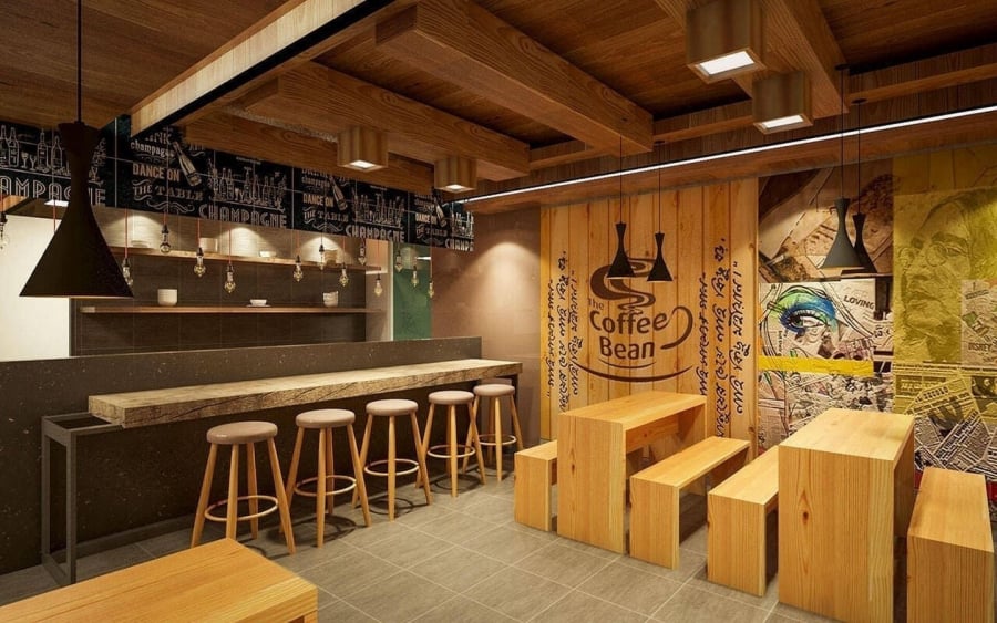 Cozy modern café interior with wooden beams, pendant lights, chalkboard artwork, and stylish seating area