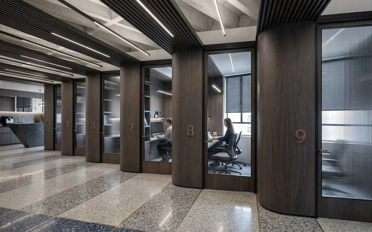 Modern luxury corporate office hallway featuring dark wood wall paneling, private glass cabins with numbered doors, and industrial linear ceiling lighting