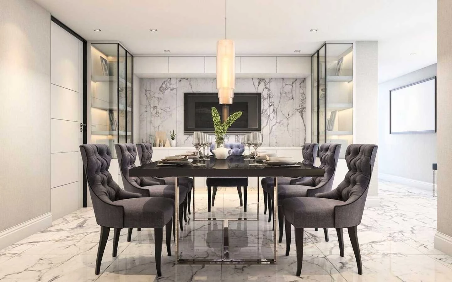 Modern luxury dining room featuring a black dining table, grey tufted velvet chairs, marble flooring, and built-in glass display cabinets