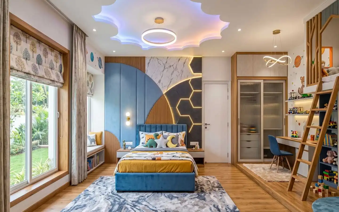 Modern kids' bedroom featuring space-themed decor, blue upholstered bed, and a wooden loft study area by interior decorators in Delhi NCR