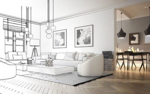 A modern living room interior showing a transition from sketch to realistic design, with a white sofa, coffee table, artwork on the wall, and dining area in the background.