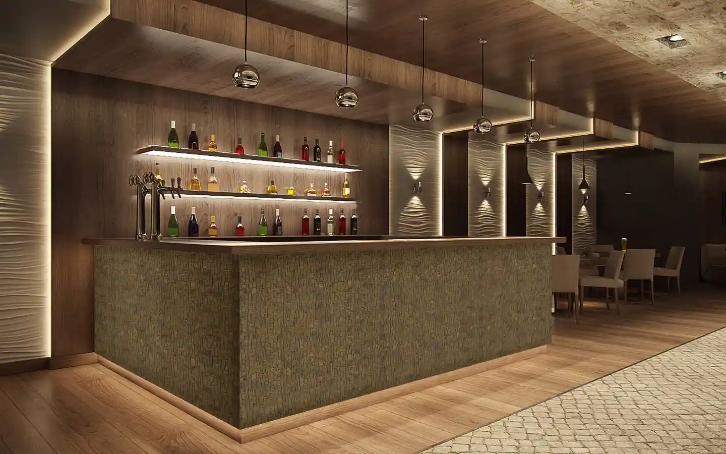 Upscale restaurant bar design featuring a textured stone counter, wooden wall panels, and warm ambient backlit shelving for liquor bottles