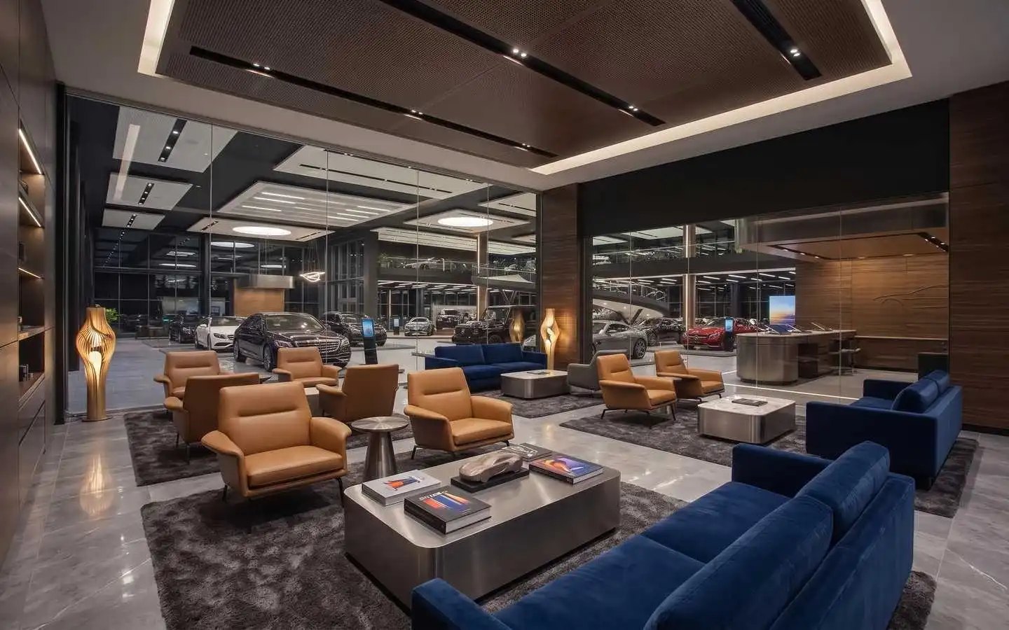Modern luxury car showroom interior featuring blue velvet sofas, tan leather armchairs, and minimalist lighting design