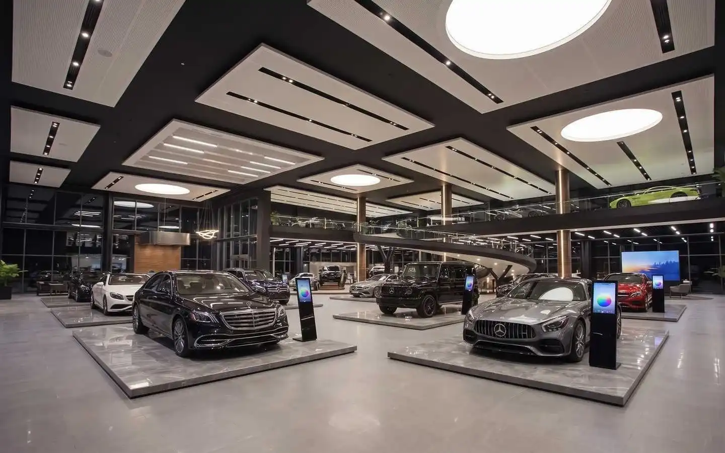 Modern luxury car showroom interior featuring minimalist ceiling lighting, marble display platforms, and premium vehicles