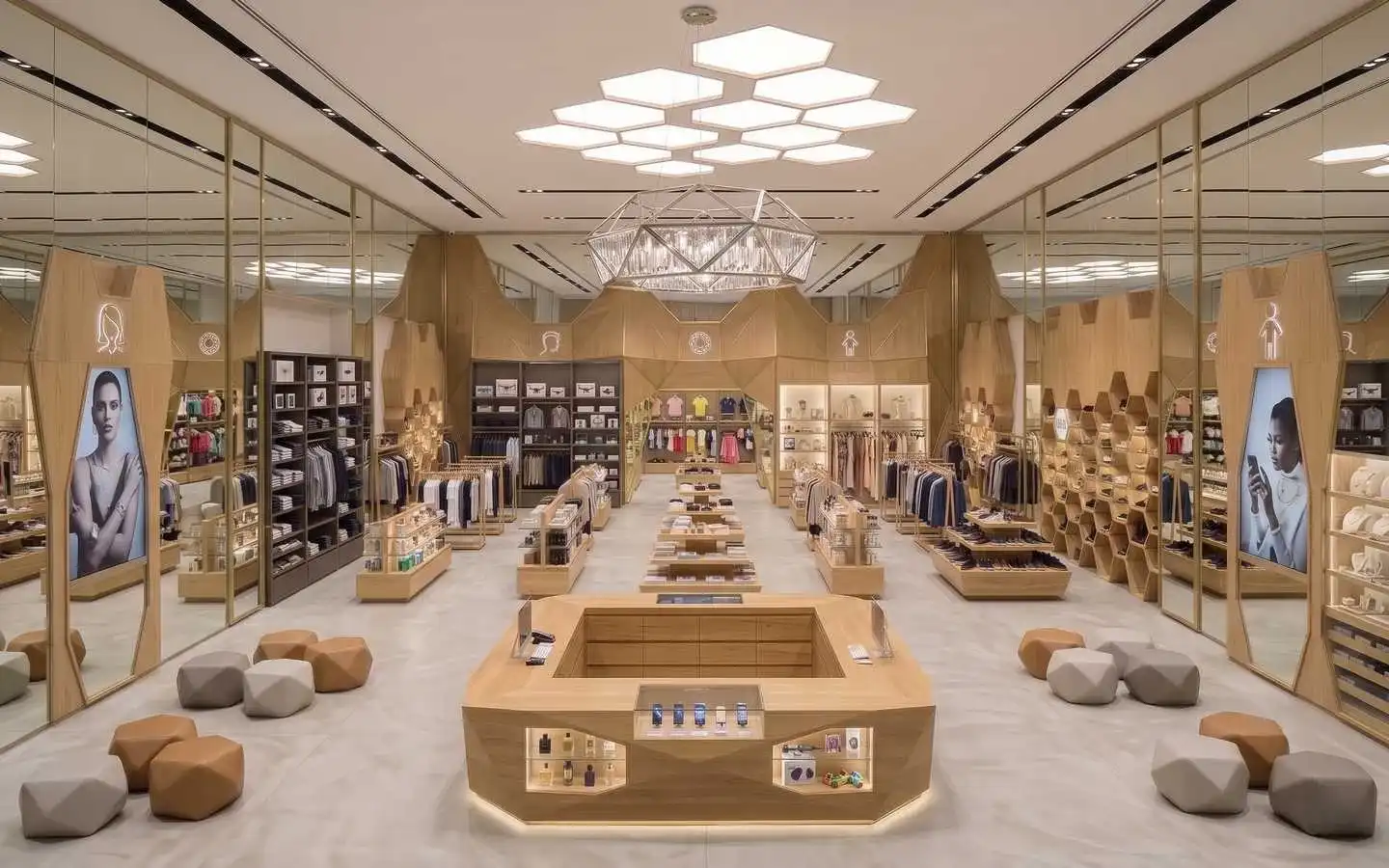 Modern luxury clothing showroom interior featuring geometric wood wall paneling, honeycomb ceiling lights, and custom wooden display islands