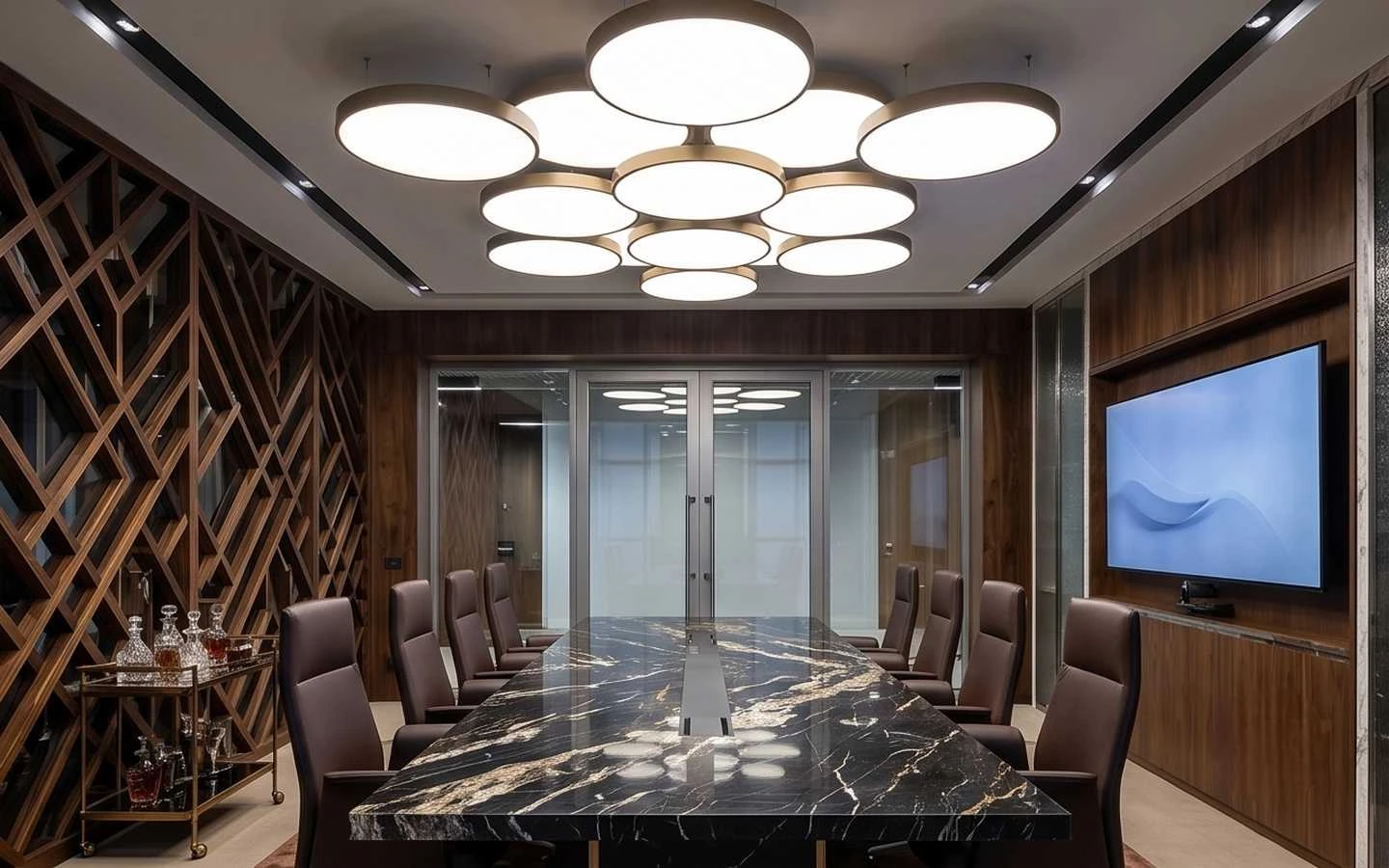 Luxury conference room interior featuring a black marble meeting table, brown leather chairs, and a modern circular cluster chandelier
