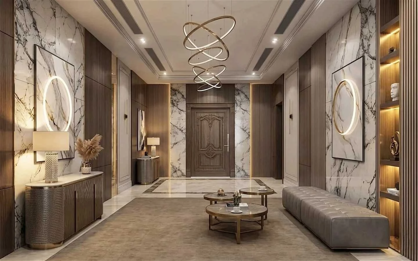 Luxury modern farmhouse entryway featuring marble wall panels, wood fluted accents, and a contemporary gold ring chandelier