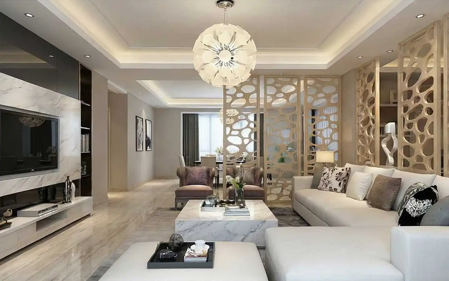 Modern luxury living room with a marble TV feature wall, white sectional sofa, marble coffee table, and decorative wooden room divider