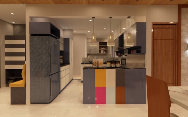 Modern open plan kitchen interior featuring blue and white cabinets, a large blue refrigerator, and a unique multi-colored paneled island illuminated by three geometric pendant lights