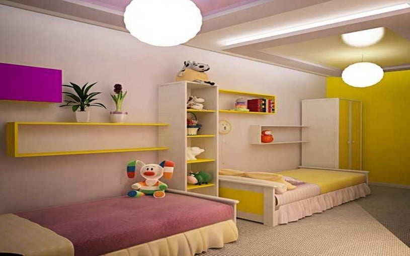 Modern shared kids' bedroom featuring a purple and yellow color scheme, custom white and yellow open shelving, two twin beds, and playful orb pendant lighting