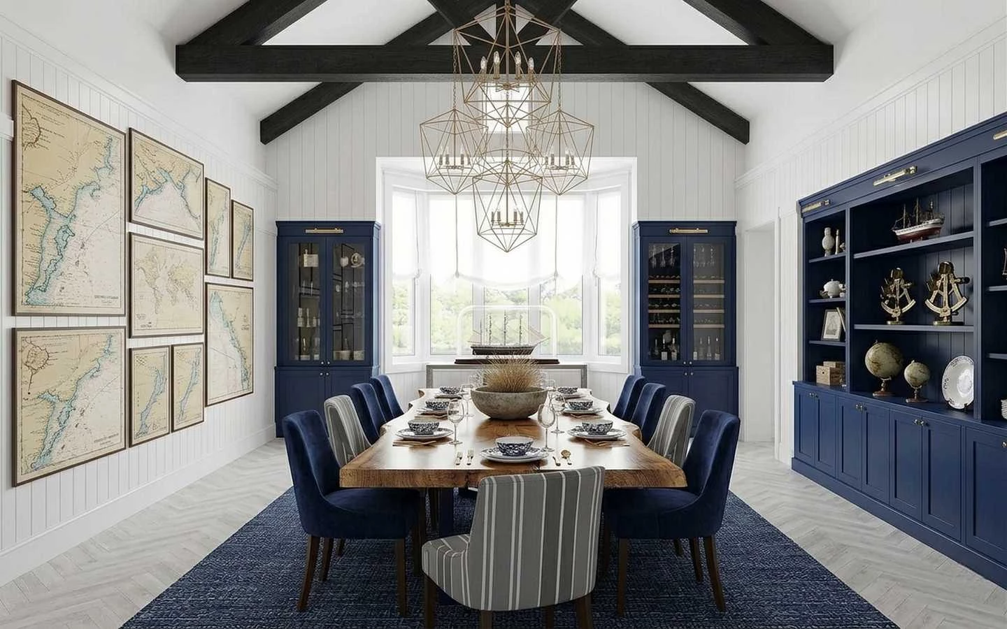 Nautical coastal farmhouse dining room with navy blue built-in cabinets, a live-edge wooden dining table, and geometric gold chandeliers