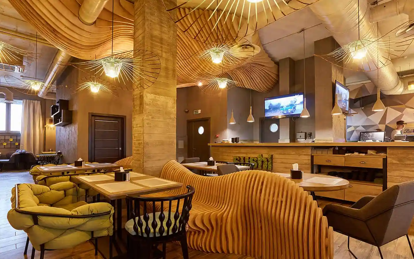 Organic parametric restaurant design with wavy wood slat ceiling and benches, large wireframe pendant lights, and modern sushi bar counter